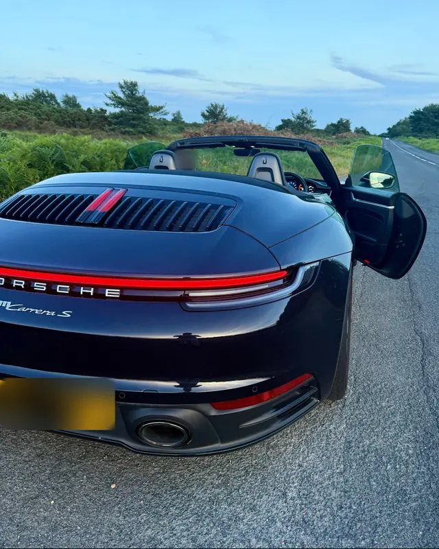James's black Porsche 911 on an open road, June 2026.